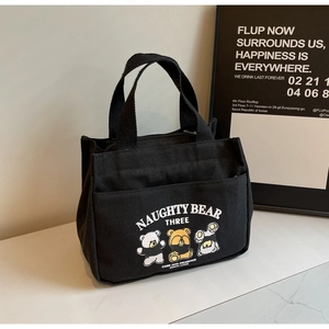 Black canvas tote bag with naughty bear cartoon print and large capacity design