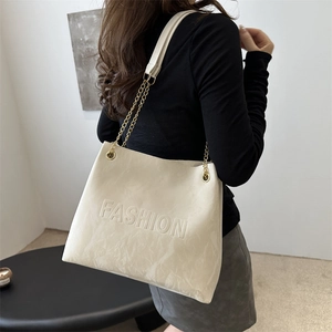 Minimalist beige marble texture tote bag with fashion embossed letters and gold chain straps