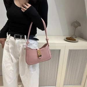 Pink minimalist faux leather underarm crescent bag with gold geometric buckle for women