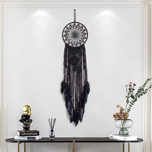 Handmade black bohemian dream catcher wall hanging with feathers and wooden beads