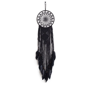 Handmade black macrame dream catcher with feathers and wood beads for wall hanging