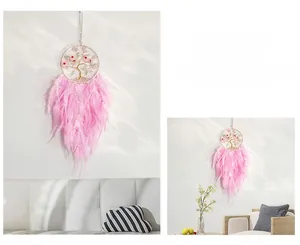 Detail showing pink Tree of Life dreamcatcher with feathers and pearls for wall decor