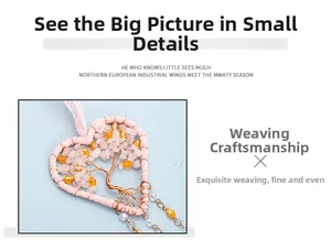 Detailed view of hand-woven heart dreamcatcher with life tree crystals and pink lace