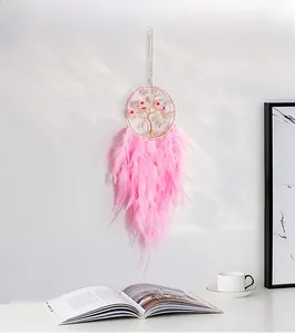 Dream catcher with pink feathers, tree of life metal frame, and pearl accents