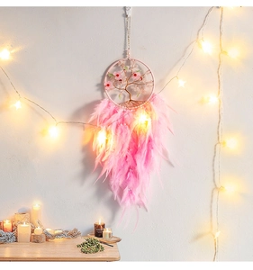 Pink cherry blossom dream catcher with tree of life design and soft feathers decor