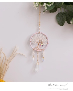 Pink tree of life dreamcatcher with healing crystal stones and moon charms hanging detail