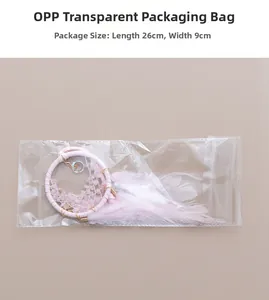Pink dreamcatcher car ornament with crystals and feathers in 26x9cm packaging