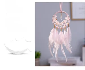 Pink dreamcatcher car pendant with delicate feathers and rose quartz crystal details