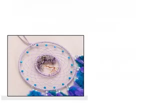 Detailed handmade tree of life pendant with purple amethyst stones and copper wire weaving