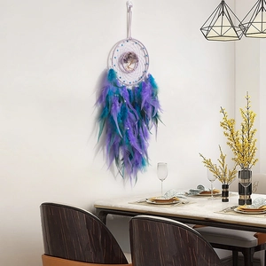 Handmade Tree of Life dream catcher with amethyst crystals and purple teal feathers