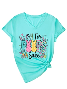 Détail d'un t-shirt à col en V avec imprimé Pâques et nœud latéral élégant sur le bas