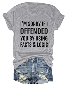 Detail of the slogan print on grey cotton t-shirt with denim shorts outfit set
