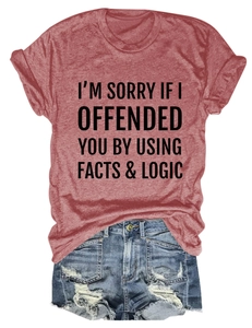 Rust red slogan tee paired with distressed denim shorts for a casual summer outfit look