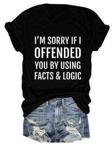 Black cotton T-shirt featuring white slogan print paired with distressed denim shorts