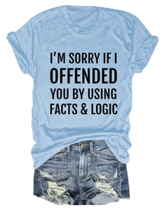 Flat lay of blue cotton t-shirt with Facts & Logic print and denim shorts
