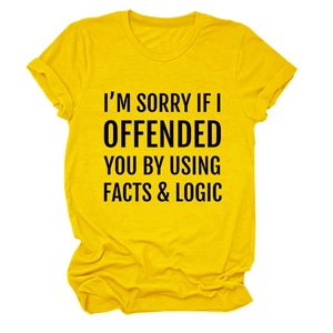 Detail of soft yellow cotton T-shirt featuring bold black typography slogan print