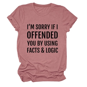 Detail of mauve crewneck t-shirt featuring bold facts and logic slogan print and rolled sleeves