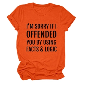Detail of orange cotton T-shirt featuring printed facts and logic slogan on chest