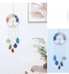 Detail of life tree wall hanging with colorful crystal stones and natural agate slices
