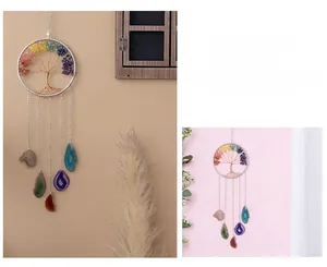 Detail of Tree of Life hanging ornament with chakra stones and polished agate slices