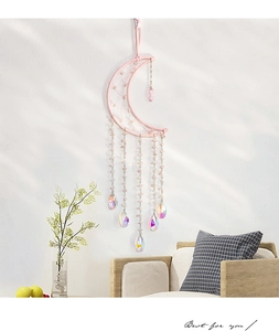 Detailed pink crystal moon dreamcatcher featuring natural crushed stone tree of life
