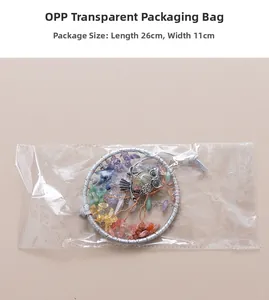 Detail of owl dream catcher pendant with colorful gemstones and packaging size 26x11cm