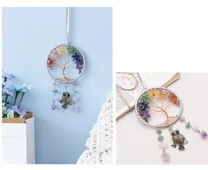 Detail of life of tree dreamcatcher featuring multi-color stones and silver owl pendant