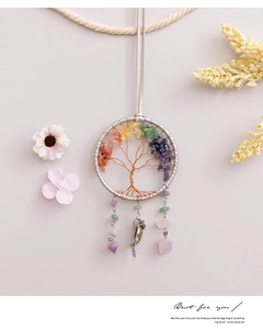 Macro view of a handcrafted Tree of Life dreamcatcher with colorful semi-precious stones