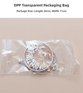 Arbre attrape-rêves en cristal blanc avec fil d'argent et pendentif lune emballé