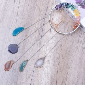 Tree of Life dreamcatcher wall hanging with 7 chakra crystals and polished agate slices