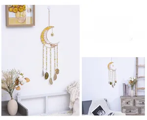 Detail of moon-shaped tree of life wall hanging with yellow citrine and agate slice