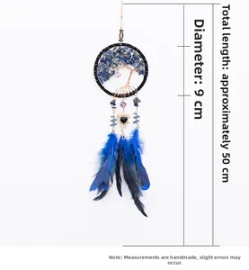 Detail of dream catcher car hanging with crystal tree of life and blue feathers