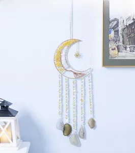 Detail of moon-shaped tree of life wall hanging with citrine stones and agate slices