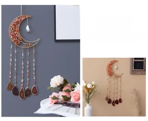 Detail of red tree of life suncatcher with moon frame and agate stone pendants