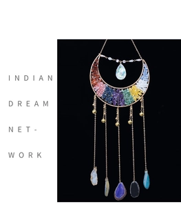 Detail of crescent moon dreamcatcher with chakra stones and agate slice pendants