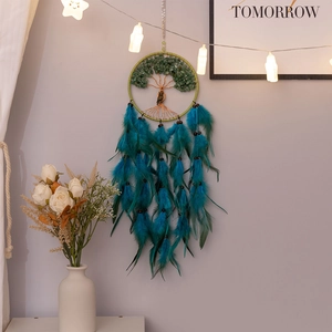 Handmade Tree of Life wall hanging with green crystals and vibrant feathers
