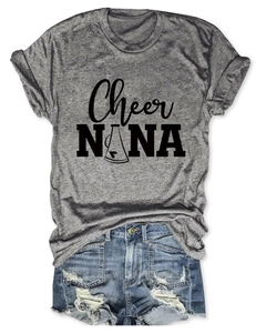 Flat lay of heather grey T-shirt with black Cheer NANA graphic and denim shorts