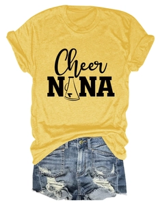 Flat lay of a yellow short sleeve T-shirt with Cheer NANA print and denim shorts