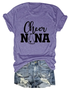 Detail of purple crew neck T-shirt with Cheer NANA print tucked into distressed denim shorts