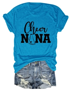 Flat lay of sky blue short sleeve t-shirt with Cheer NANA print and distressed denim shorts