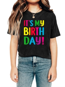 Close-up of black cotton kids birthday T-shirt featuring colorful It's My Birthday print