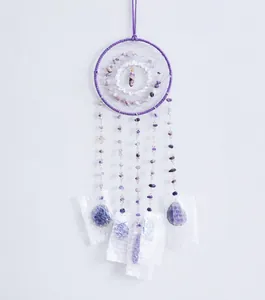 Vertical wall decor dreamcatcher with purple amethyst crystals and dangling gemstones