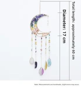 Detail of moon dreamcatcher with healing chakra stones and agate slices hanging 60cm