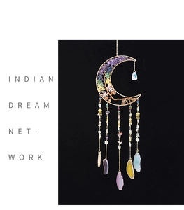 Detail of moon dreamcatcher with tree of life weaving and colorful crystal stones