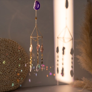 Purple agate suncatcher with geometric gold frame and crystal prism ball decor