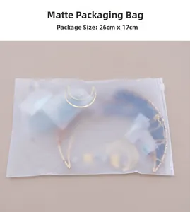 Frosted zipper packaging bag 26x17cm with golden crescent moon accessories inside