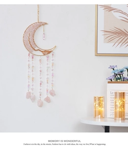 Detailed wall hanging moon dreamcatcher with pink quartz stones and golden tree design