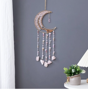 Detailed moon-shaped crystal dreamcatcher with pink quartz stones and tree of life design