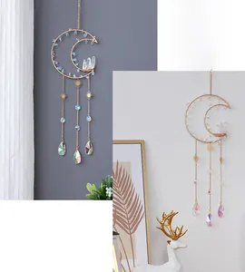 Moon-shaped crystal suncatcher with gold metal frame and rainbow prisms for home decor