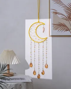 Acchiappasogni in cristallo a forma di luna con gocce d'ambra e catenelle di perline